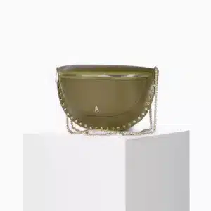Bandolera de piel artesanal francesa con cadena dorada y cuerda rosa pastel intercambiables, boutique Unike Pamplona.